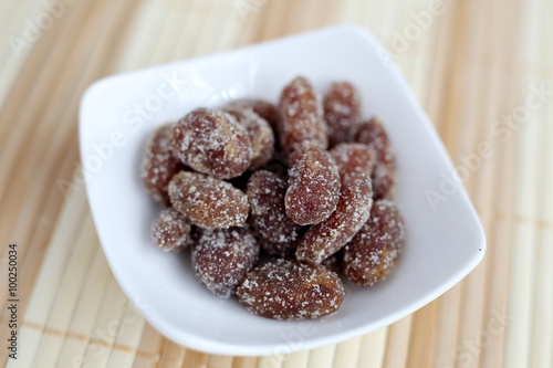 Rakkasei Amanatto is a Japanese confection dusted with sugar and boiled soft peanut.
