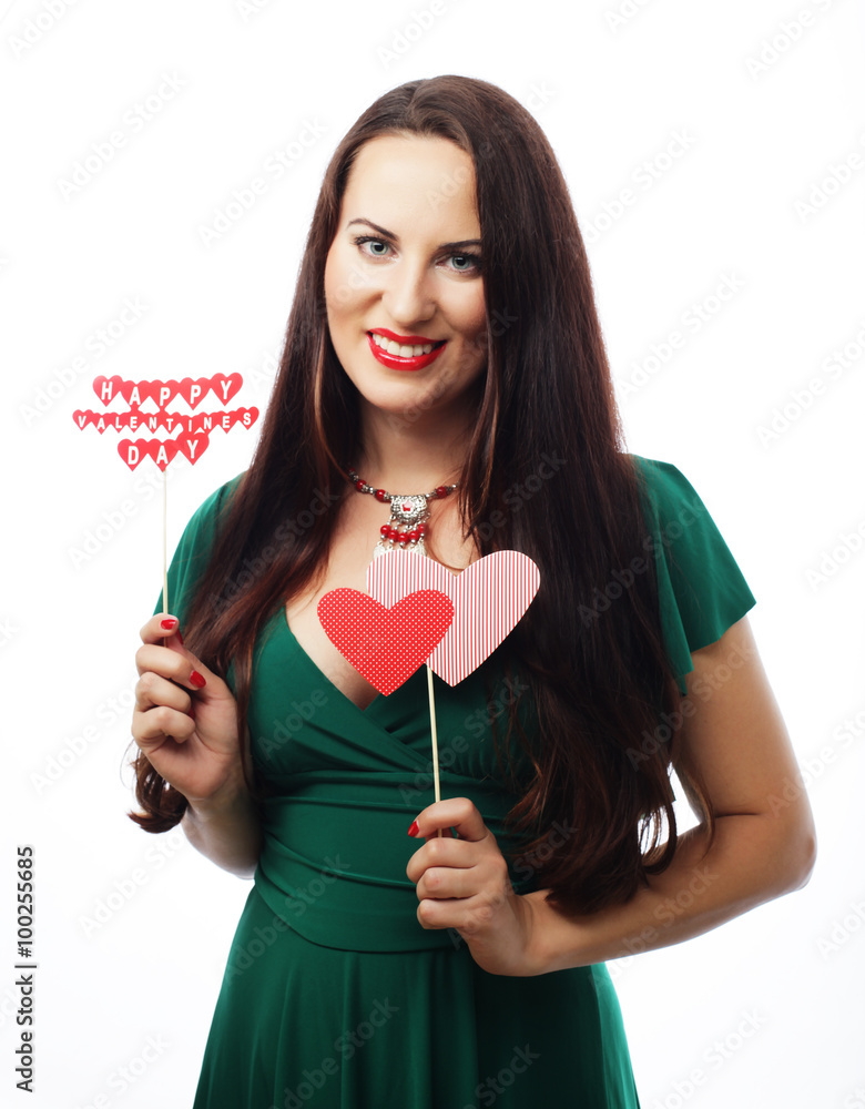 beautiful woman wearing green dress holding paper hearts beautiful woman wearing green dress holding paper hearts