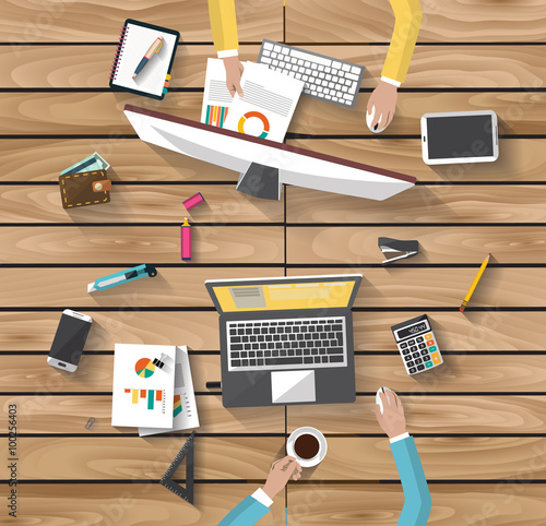 Flat design of business concept - top view of team of coworkers working together around a desk of wood  with laptop and tablet and smarth-phone. the image represent a team creativity and bright ideas.