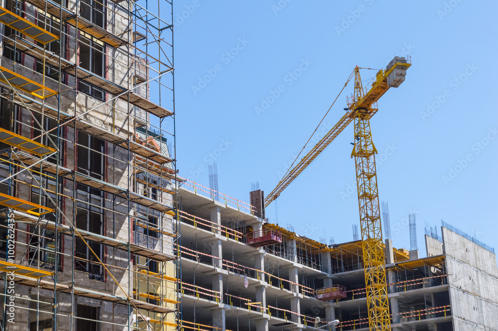 Building construction with crane Building construction with crane