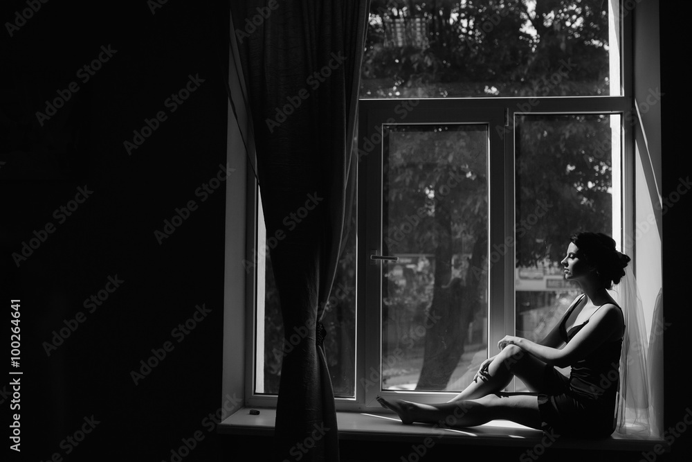 bride looking through the window bride looking through the window