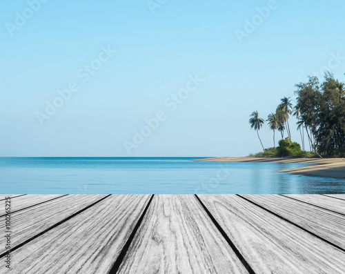 Wood Terrace on The Beach with Clear Sky and Blue Sea with Copy Space to input Text used as Template