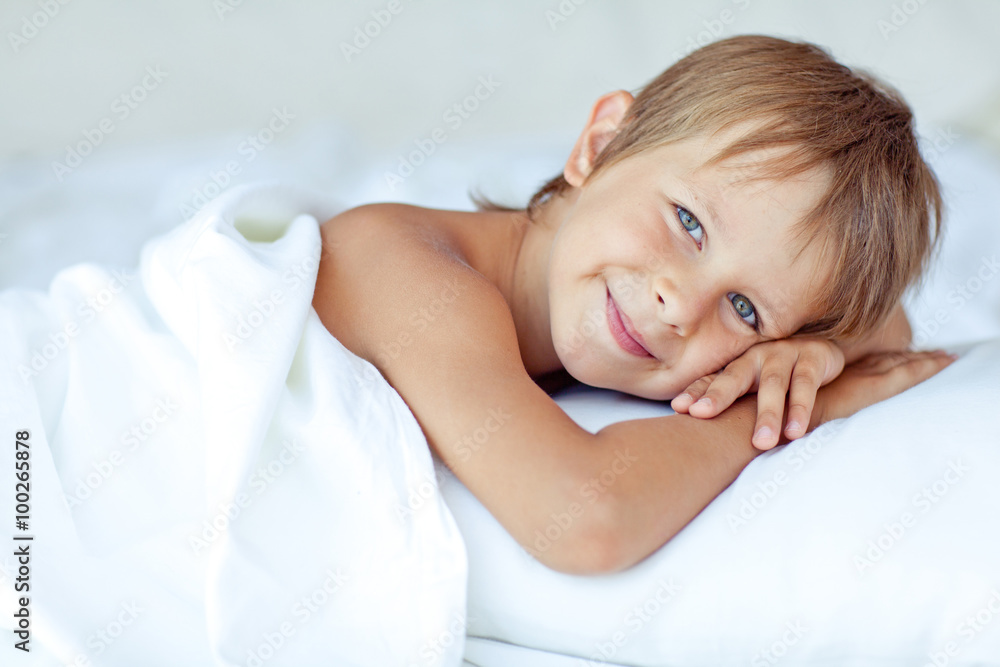 happy little boy in morning bed happy little boy in morning bed