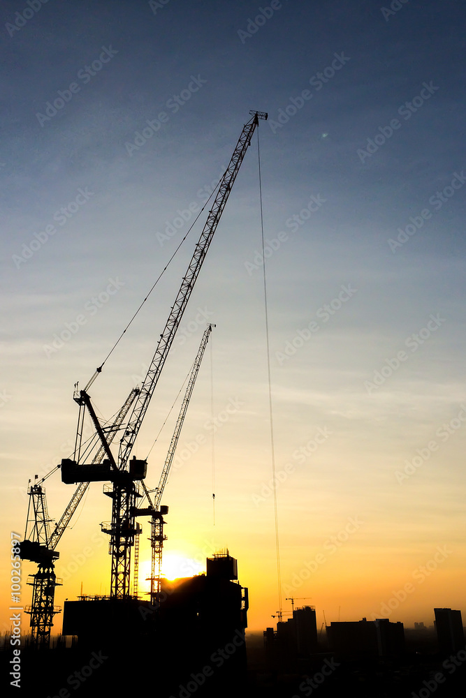 Silhouette of Construction Site in The City while Sunset