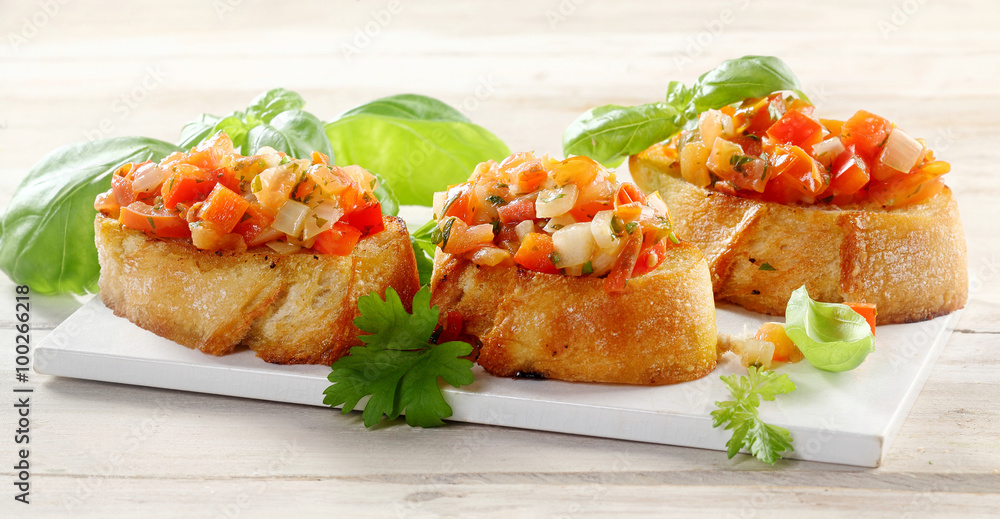 Delicious vegetable bruschetta on toasted baguette Delicious vegetable bruschetta on toasted baguette