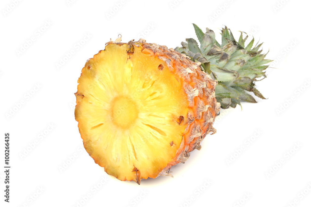 Pineapple and its slices on a white background Pineapple and its slices on a white background
