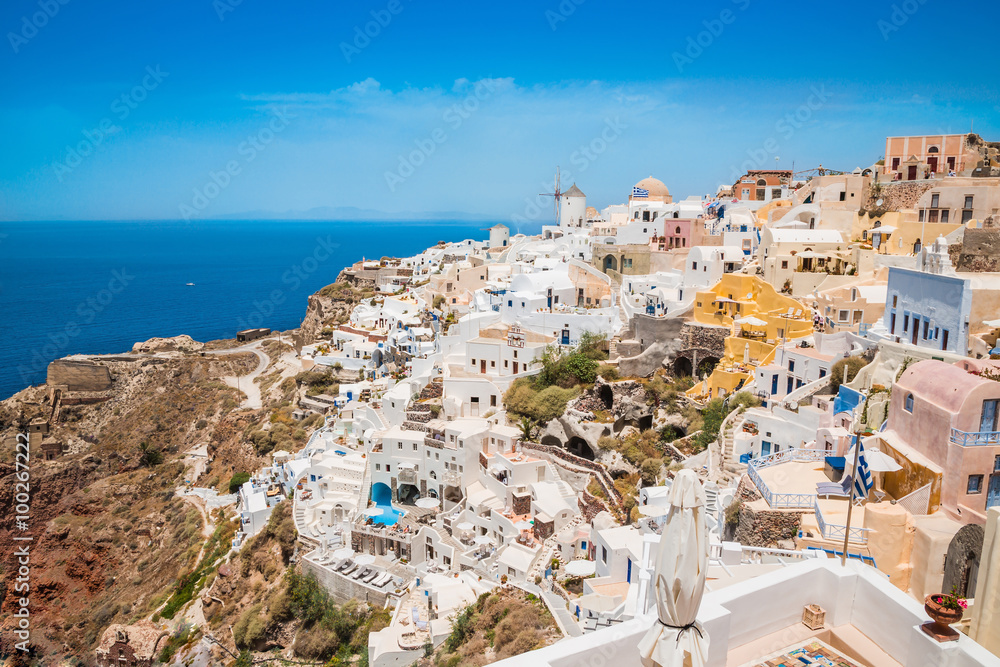 Panoramic shot of houses and villas at Oia village on Santorini