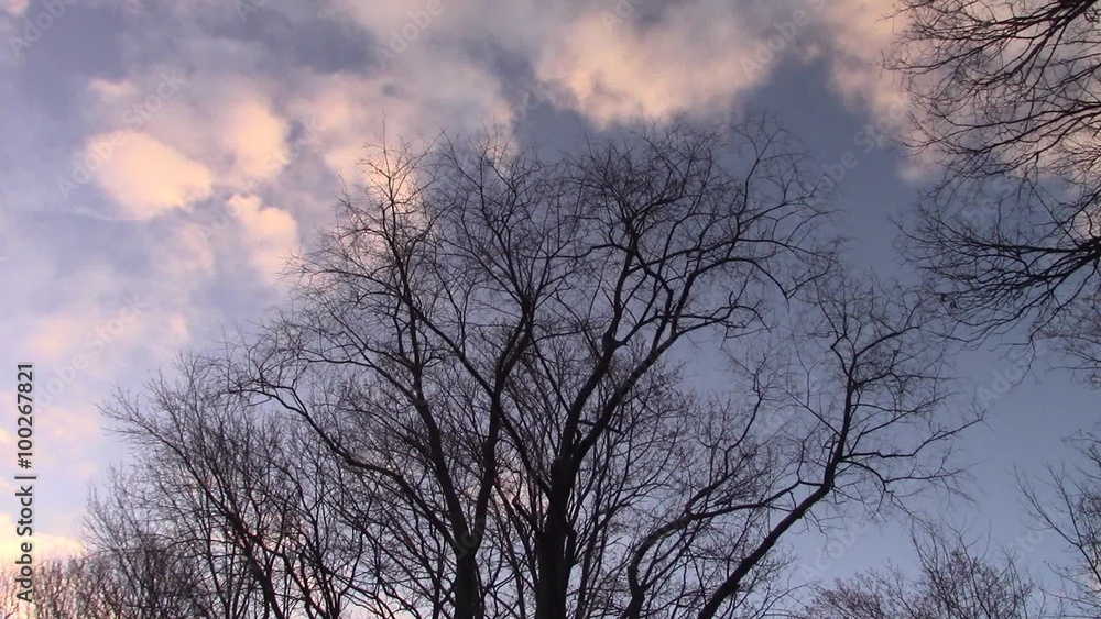 fast motion of sunlit morning clouds in winter fast motion of sunlit morning clouds in winter