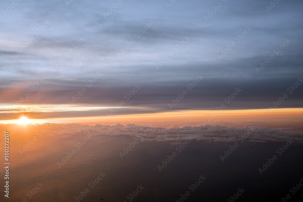 Morning Sun & Cloudy sky from airplane Through window onto jet engine -  flying view (window airplane)
