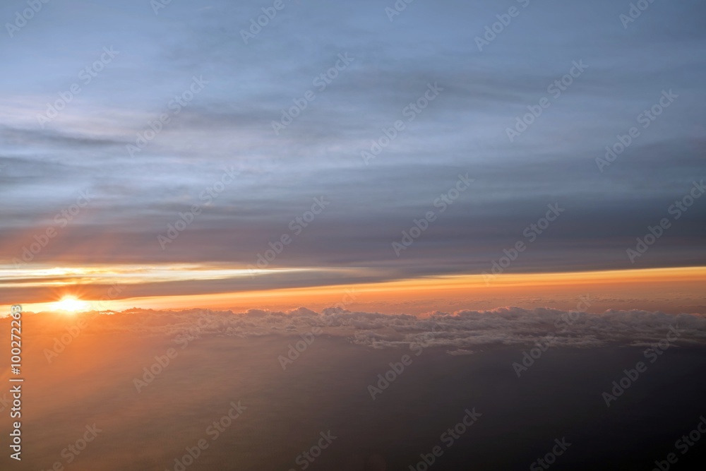 Morning Sun & Cloudy sky from airplane Through window onto jet engine -  flying view (window airplane)
