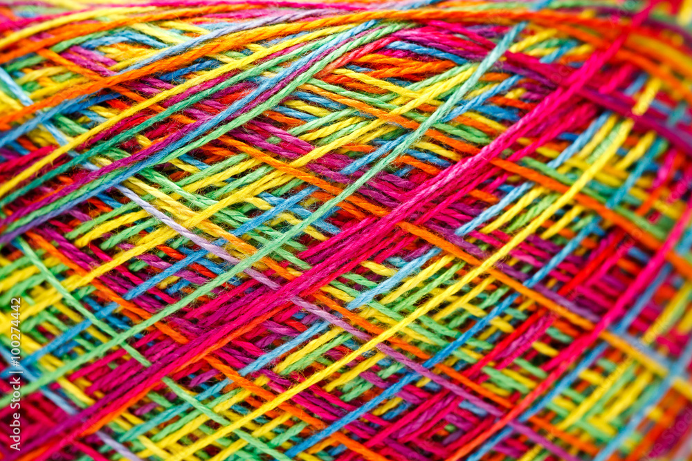 Sewing threads as a multicolored background close up Sewing threads as a multicolored background close up