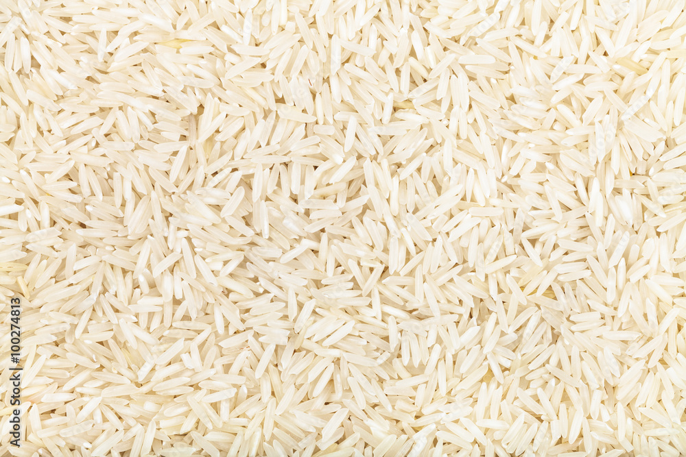 long grains of uncooked white Basmati rice long grains of uncooked white Basmati rice