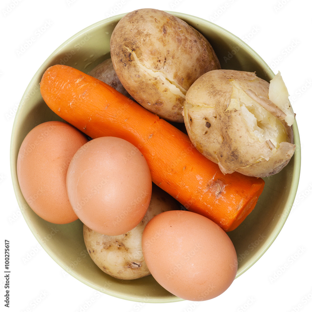 above view of boiled eggs, carrot and potatoes above view of boiled eggs, carrot and potatoes