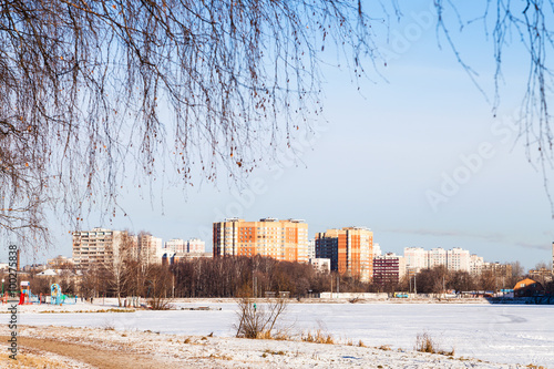 Wallpaper Mural frozen lake and urban houses in winter Torontodigital.ca