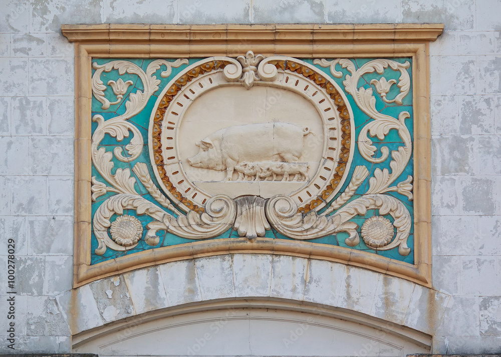 Obraz premium Bas-relief of the Soviet era in the building of the livestock pa