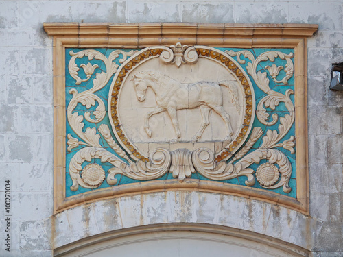 Bas-relief of the Soviet era in the building of the livestock pa photo