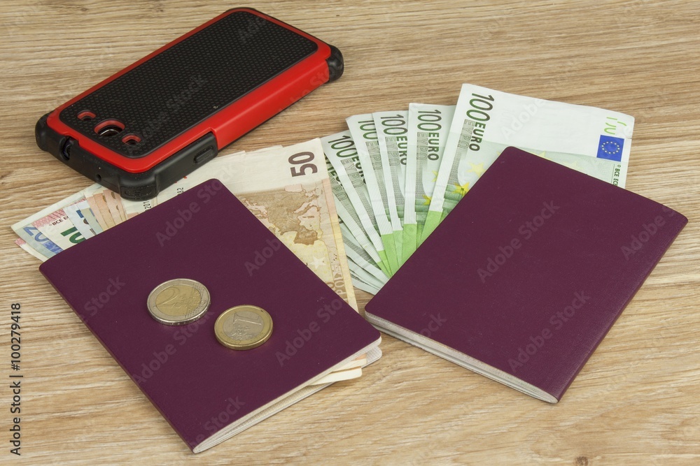 Passport and money on wooden table. Valid EURO banknotes. Illegal migration for money. Paying smugglers for crossing the border.
Passport and money on wooden table. Valid EURO banknotes. Illegal migration for money. Paying smugglers for crossing the border.
