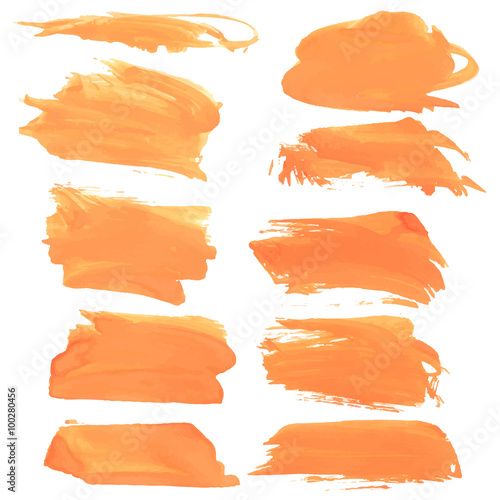 Abstract realistic smears orange gouache paint on white paper