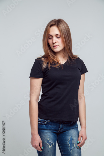 girl in the black shirt isolated over white background