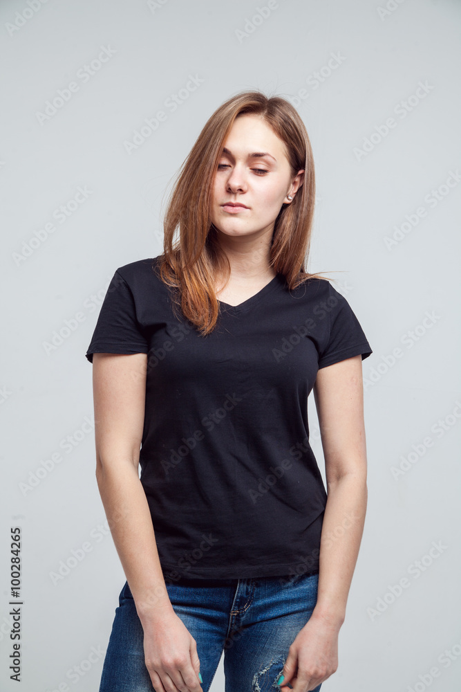 girl in the black shirt isolated over white background girl in the black shirt isolated over white background