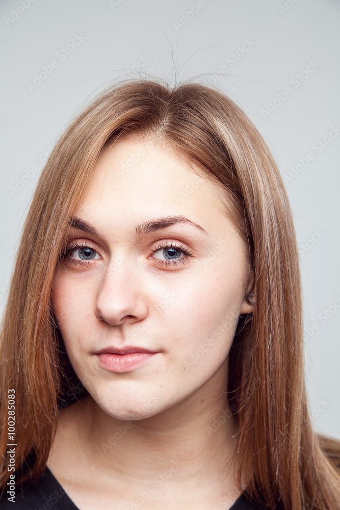 Attractive woman with black t-shirt isolated on a over white background Attractive woman with black t-shirt isolated on a over white background