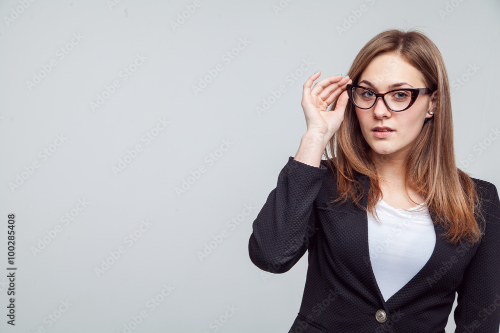 Young, beautiful girl in a jacket, isolated on a white background. Young, beautiful girl in a jacket, isolated on a white background.