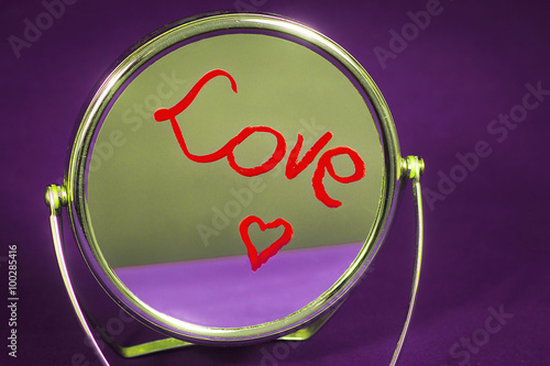 The inscription on the mirror written in lipstick