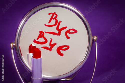 The inscription on the mirror written in lipstick