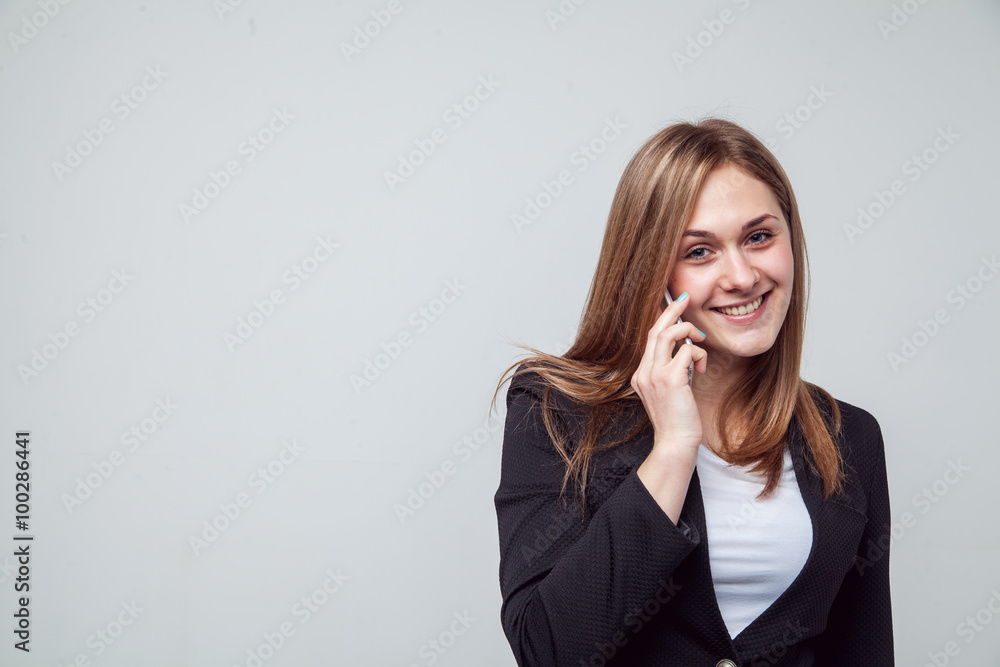 Beautiful smiling business woman talking on the phone Beautiful smiling business woman talking on the phone
