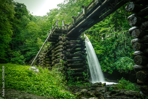Harnessing Energy. Water flows down a flume to power an 18th century grist mill. Great Smoky Mountains National Park. Gatlinburg, Tennessee.