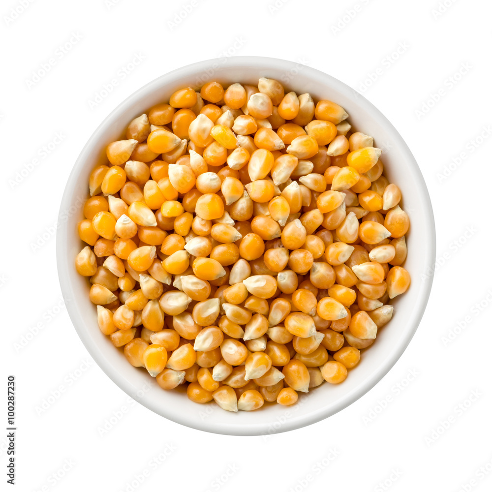 Popcorn Kernels Uncooked in a Ceramic Bowl Popcorn Kernels Uncooked in a Ceramic Bowl