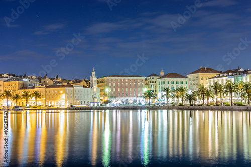 Cityscape of old traditional city Split, night scene. / Waterfront view at old, traditional city Split in Croatia. Cityscape photography during night, long exposure.
