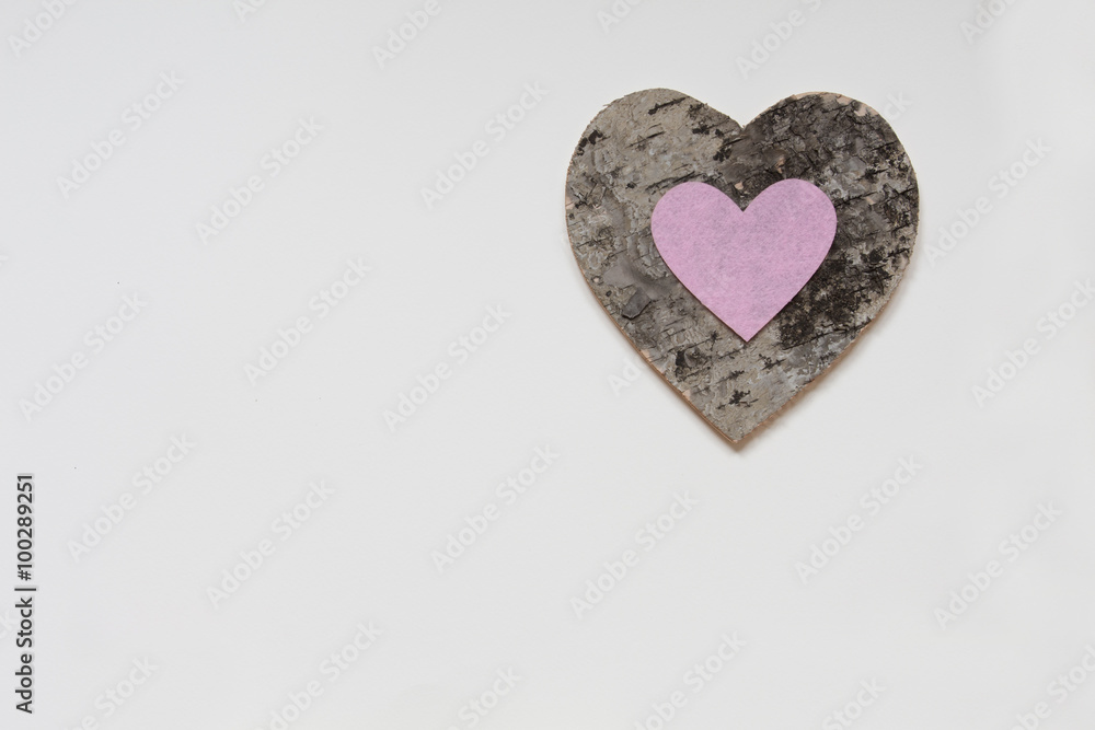 Pink Heart on Wooden heart On White Background