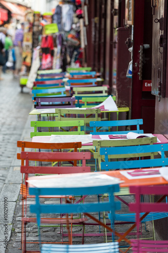 Paris - Very colorful Parisian outdoor cafe in Montmartre © wjarek