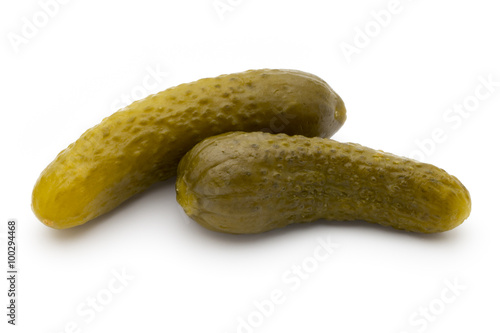 Pickled cucumbers isolated on white background.