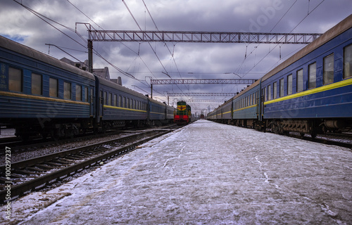  train near the station in stormy weather with dark clouds