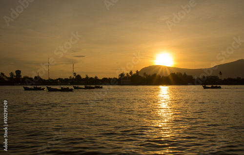 Fishing boats returning with the day's catch. Kampot, Cambodia.  © renatokawasaki