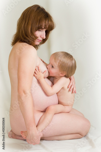 pregnant woman breast feeding