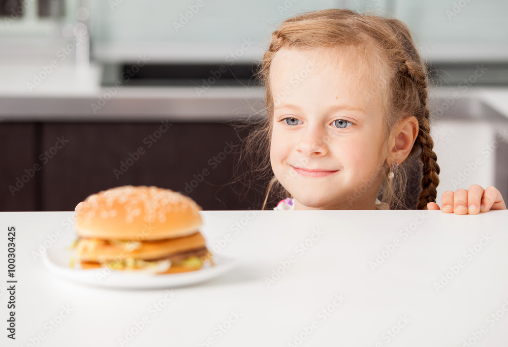Child with hamburger Child with hamburger