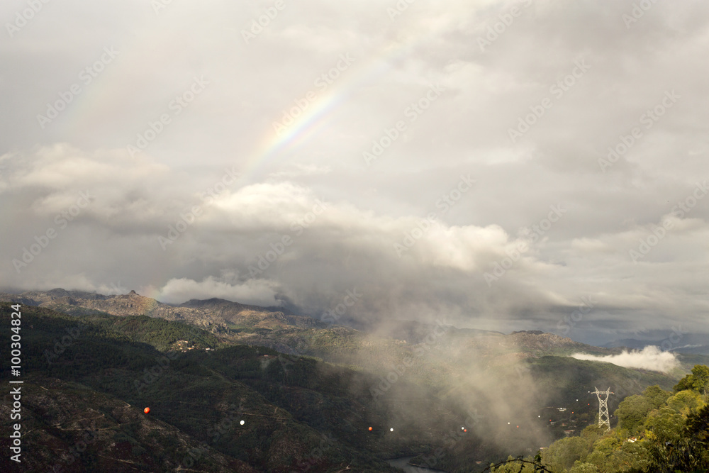 Rainbow and Low Cloud on the Valley