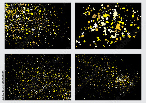 Imitation of gold glitter explosion set on black background made of spray paint. Golden festive blow texture of confetti collection. Golden winter grunge grainy spray abstract texture of snowflakes.