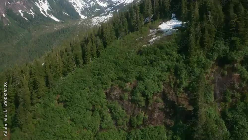 Time-lapse out the window of an airplane over mountains near Ketchikan, AK. Time-lapse out the window of an airplane over mountains near Ketchikan, AK.