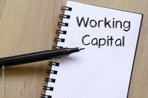 Working capital write on notebook photo