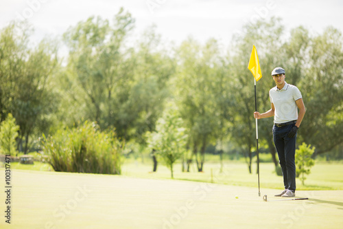 Young man playing golf © BGStock72