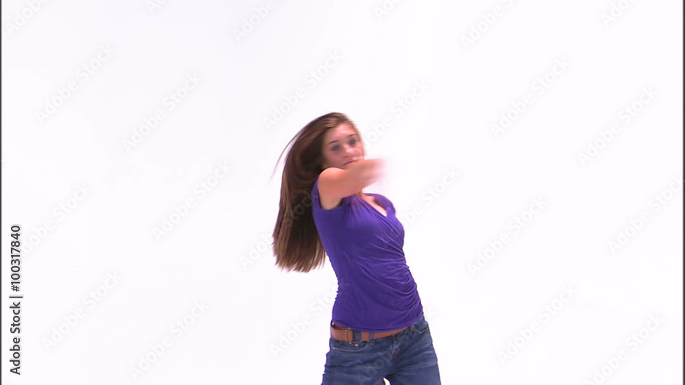 Clip of a girl in a purple shirt dancing on a white background. Clip of a girl in a purple shirt dancing on a white background.