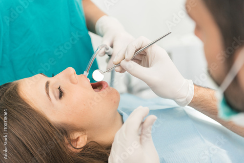 doctor and the assistant during a surgery - Stock image
