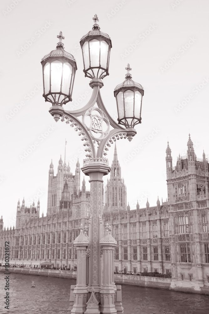 Lamppost and Houses of Parliament in Black and White Sepia Tone in London, England, UK