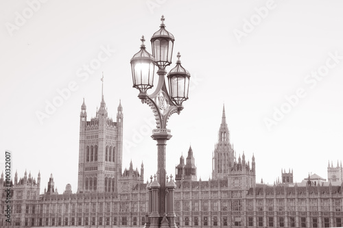 Lamppost and the Houses of Parliament; London, UK in Black and White Sepia Tone