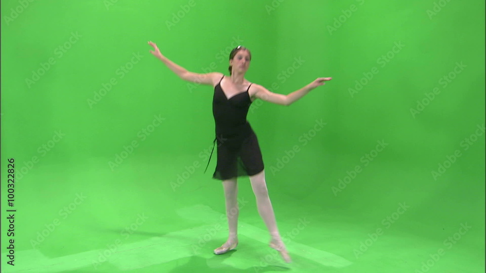 Shot of a ballerina in black dancing on a green screen. Shot of a ballerina in black dancing on a green screen.