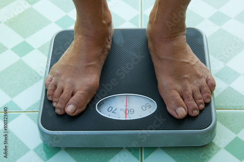feet on the weight scale